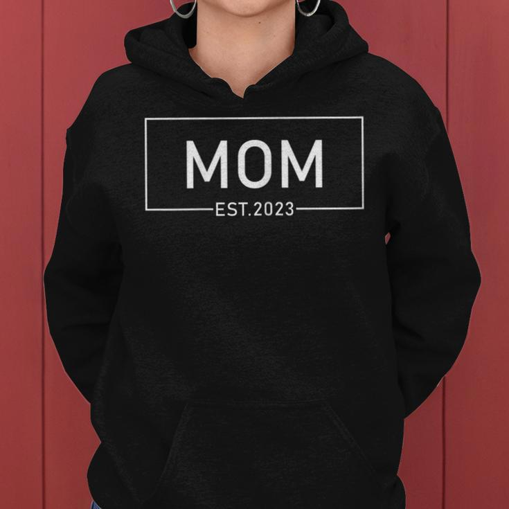 Womens Mom Est 2023 Promoted To Mother 2023 First Mothers Day Women Hoodie