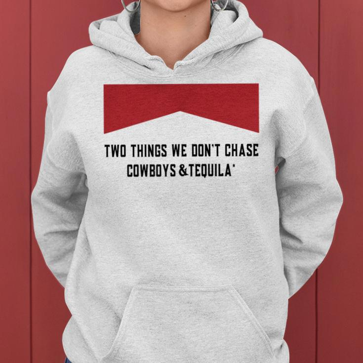 Two Things We Dont Chase Cowboys And Tequila Funny Women Hoodie