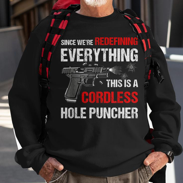 We Are Redefining Everything This Is A Cordless Hole Puncher Sweatshirt Gifts for Old Men