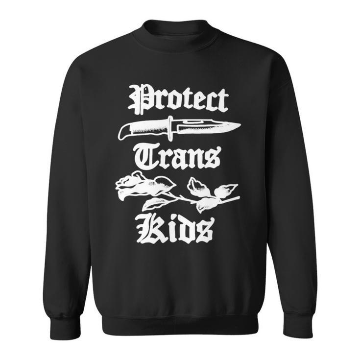 Peggy Flanagan Wearing Protect Trans Kids Sweatshirt