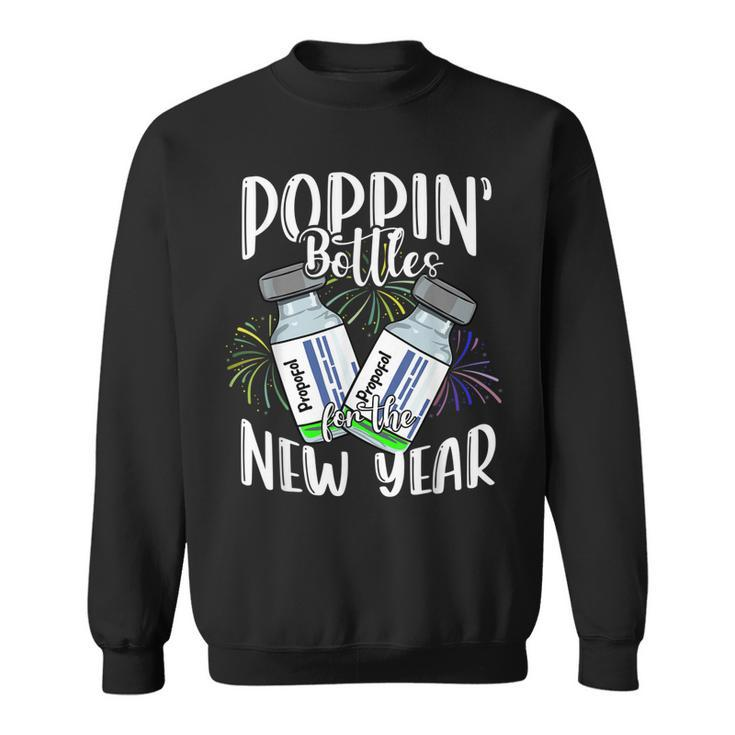 Poppin Bottles For The New Year Funny Icu Nurse Crew 2023  Sweatshirt