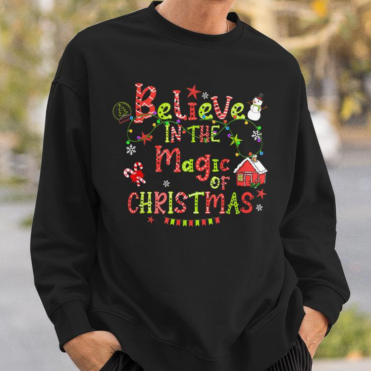 Believe In The Magic Of Christmas Santa Snowman Candy Cane Men Women Sweatshirt Graphic Print Unisex Gifts for Him