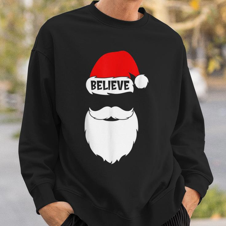 Christmas Believe In Santa Claus Believe Quote On Santa Hat Men Women Sweatshirt Graphic Print Unisex Gifts for Him