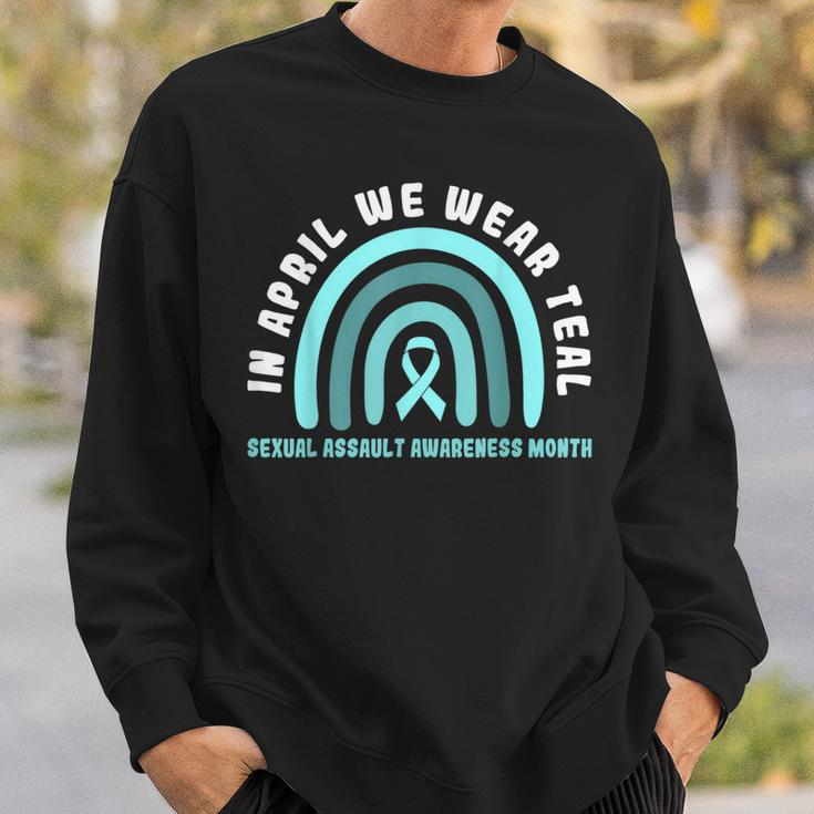 In April We Wear Teal Sexual Assault Awareness Month Sweatshirt Gifts for Him