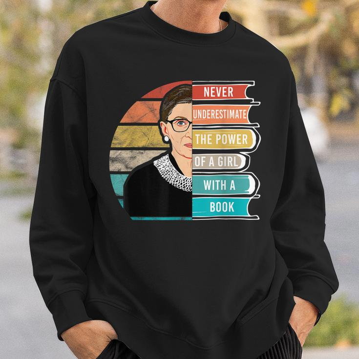 Never Underestimate The Power Of A Girl With Book Rbg Sweatshirt Gifts for Him