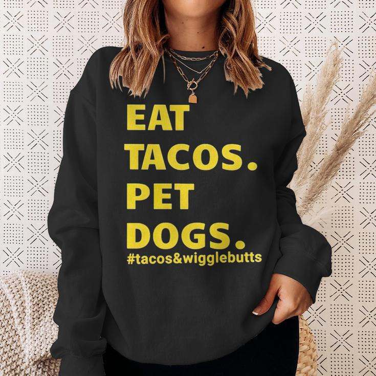 Eat Tacos Pet Dogs Tacos And WigglebuttsSweatshirt Gifts for Her