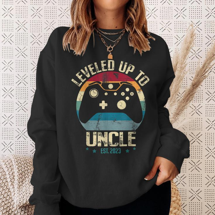 I Leveled Up To Uncle 2023 Promoted To First Time New Uncle Sweatshirt Gifts for Her