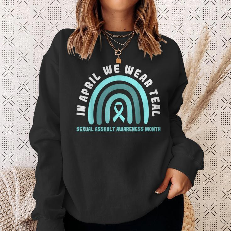 In April We Wear Teal Sexual Assault Awareness Month Sweatshirt Gifts for Her