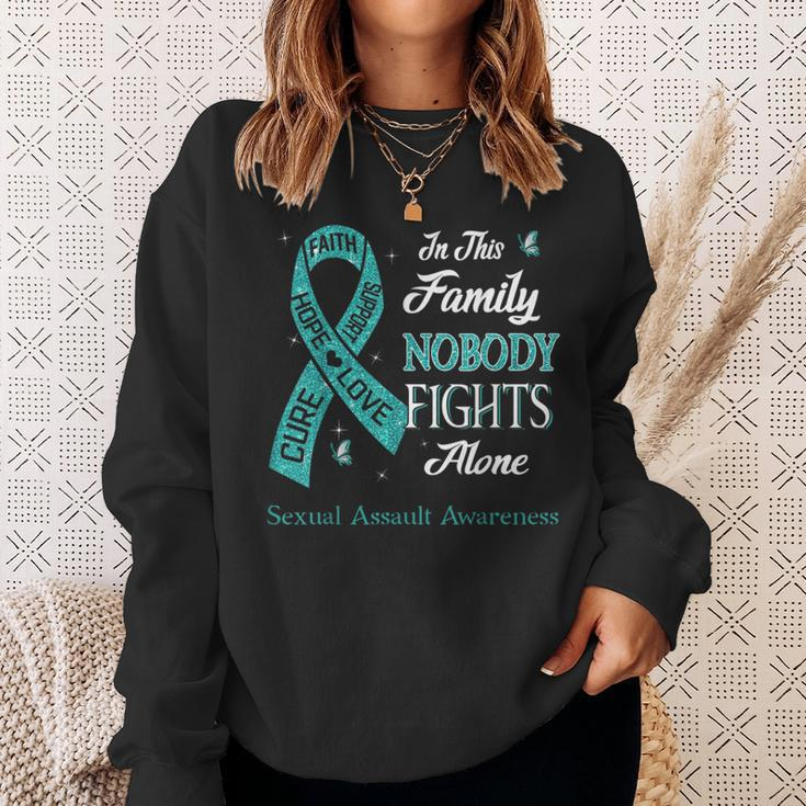In This Family Nobody Fights Alone Sexual Assault Awareness Sweatshirt Gifts for Her