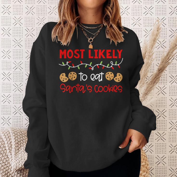 Most Likely To Eat Santas Cookies Funny Christmas Holiday Men Women Sweatshirt Graphic Print Unisex Gifts for Her