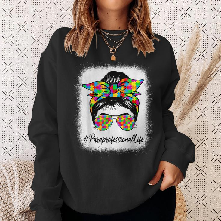 Paraprofessional Messy Bun Supporting Autism Awareness Month Sweatshirt Gifts for Her