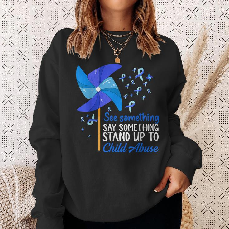 Pinwheel See Say Something Stand-Up To Child Abuse Awareness Sweatshirt Gifts for Her