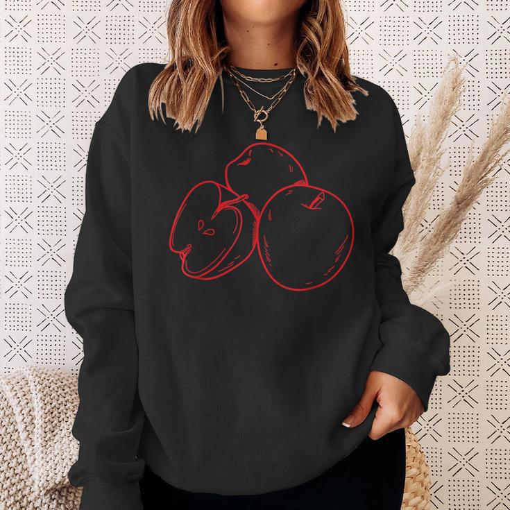 Schwarzes Sweatshirt mit Rotem Apfel-Design, Kreatives Obst Motiv Tee Geschenke für Sie