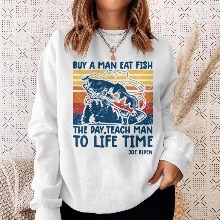 Funny Joe Biden Quote Buy A Man Eat Fish Fishing Sweatshirt Gifts for Her