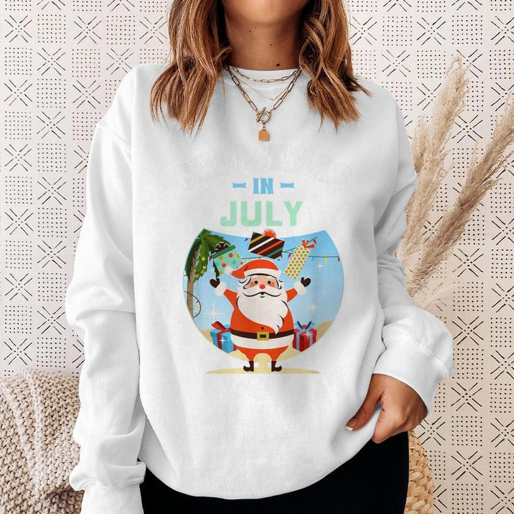 Tropischer Weihnachtsmann Sweatshirt, Weihnachten im Juli Design Geschenke für Sie