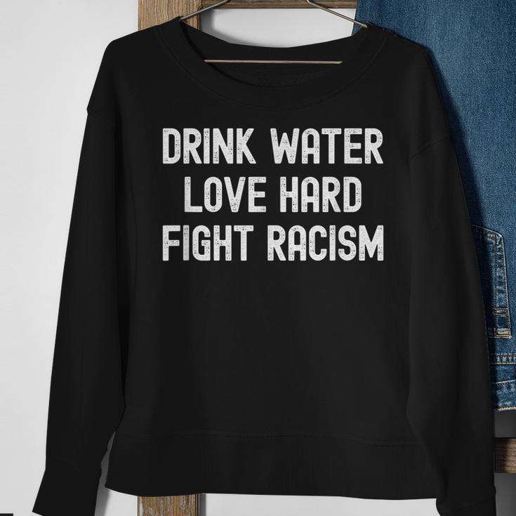 Drink Water Love Hard Fight Racism Respect Dont Be Racist Sweatshirt Gifts for Old Women