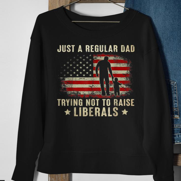 Just A Regular Dad Trying Not To Raise Liberals Fathers Day Sweatshirt Gifts for Old Women