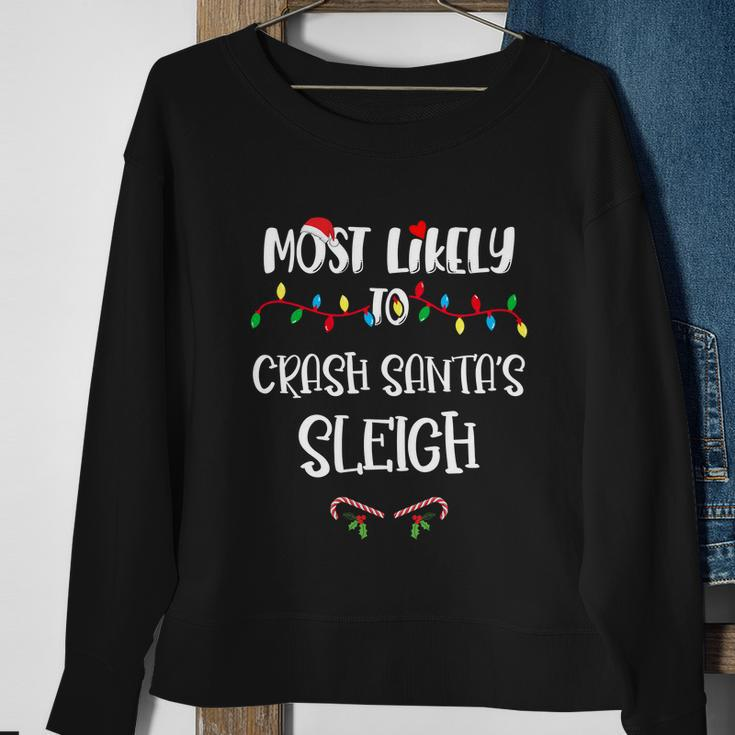 Most Likely To Crash Santa’S Sleigh Christmas Shirts For Family Sweatshirt Gifts for Old Women