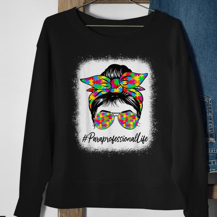 Paraprofessional Messy Bun Supporting Autism Awareness Month Sweatshirt Gifts for Old Women