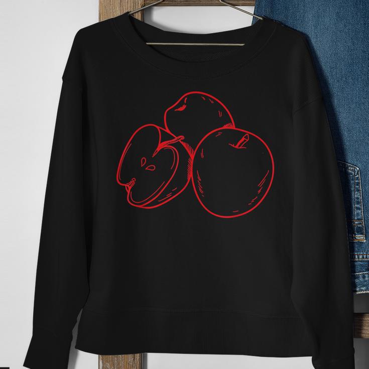 Schwarzes Sweatshirt mit Rotem Apfel-Design, Kreatives Obst Motiv Tee Geschenke für alte Frauen