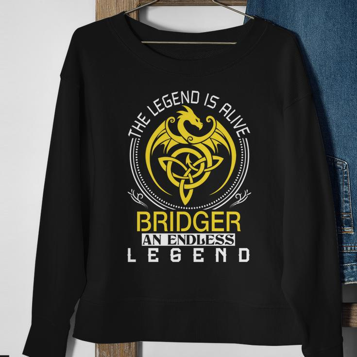 The Legend Is Alive Bridger Family Name Sweatshirt Gifts for Old Women