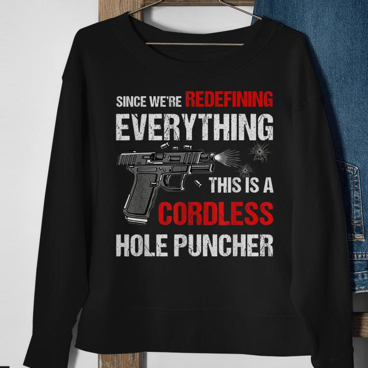 We Are Redefining Everything This Is A Cordless Hole Puncher Sweatshirt Gifts for Old Women