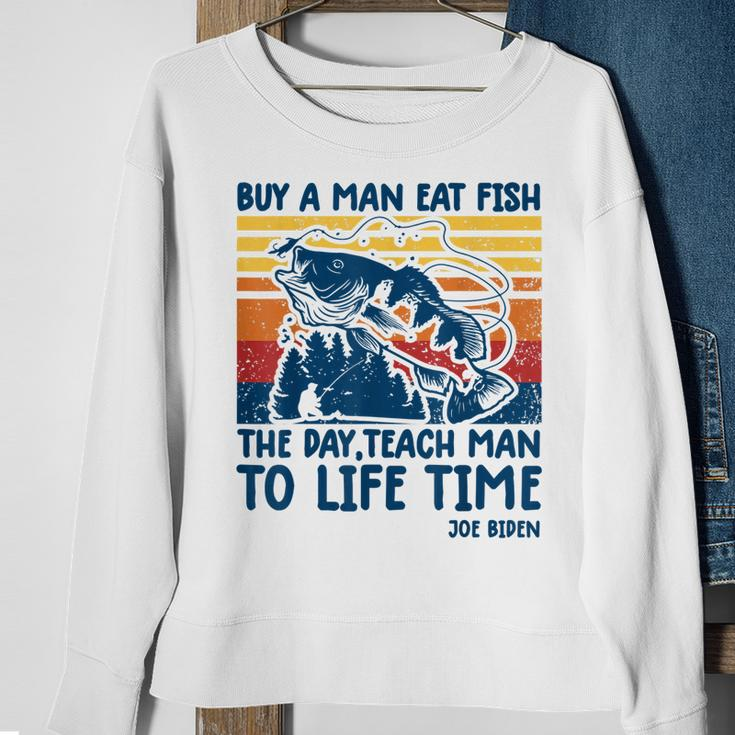 Funny Joe Biden Quote Buy A Man Eat Fish Fishing Sweatshirt Gifts for Old Women