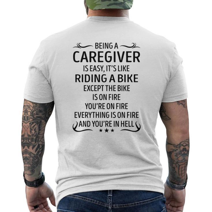 Being A Caregiver Like Riding A Bike Men's T-shirt Back Print