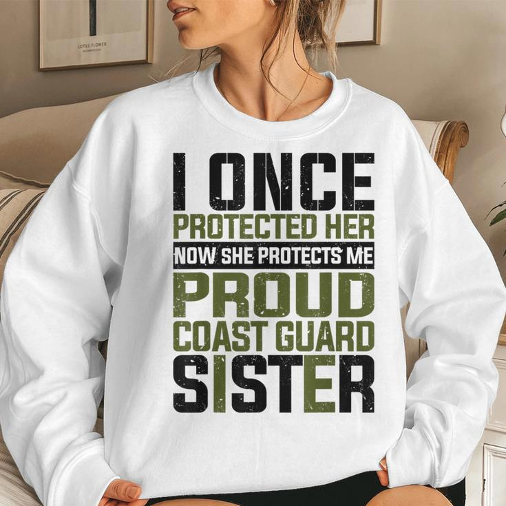 Coast Guard Now She Protects Me Proud Coast Guard Sister Women Crewneck Graphic Sweatshirt Gifts for Her