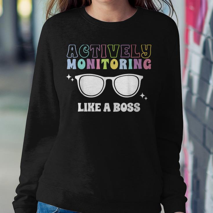 Actively Monitoring Like A Boss Testing Day Funny Teacher Women Crewneck Graphic Sweatshirt Personalized Gifts