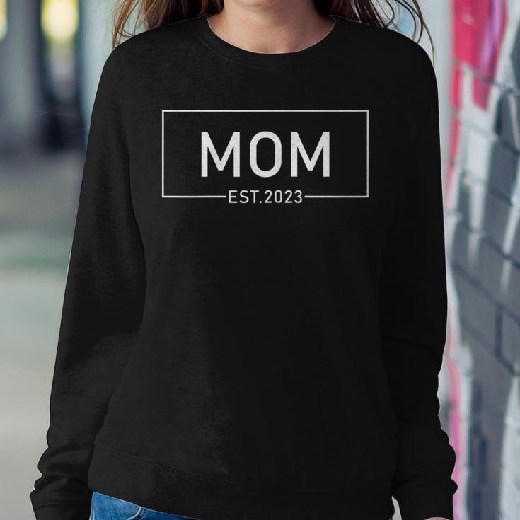 Womens Mom Est 2023 Promoted To Mother 2023 First Women Sweatshirt Unique Gifts