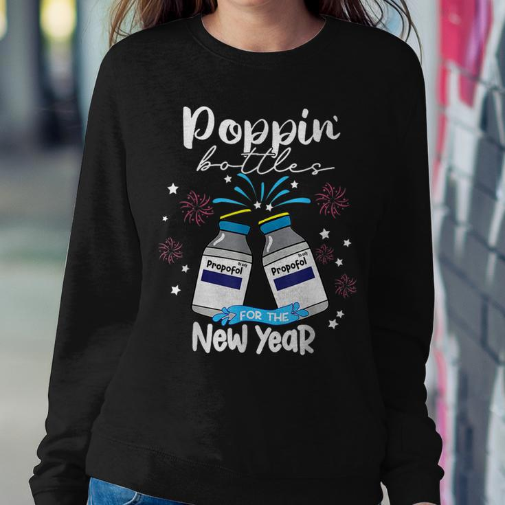 Poppin Bottles For The New Year Funny Icu Nurse Crew 2023 Women Crewneck Graphic Sweatshirt Funny Gifts