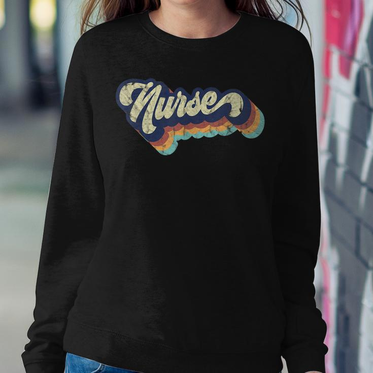 Retro Nurse Woman Wears A Nursing On Nurses Day Women Crewneck Graphic Sweatshirt Funny Gifts