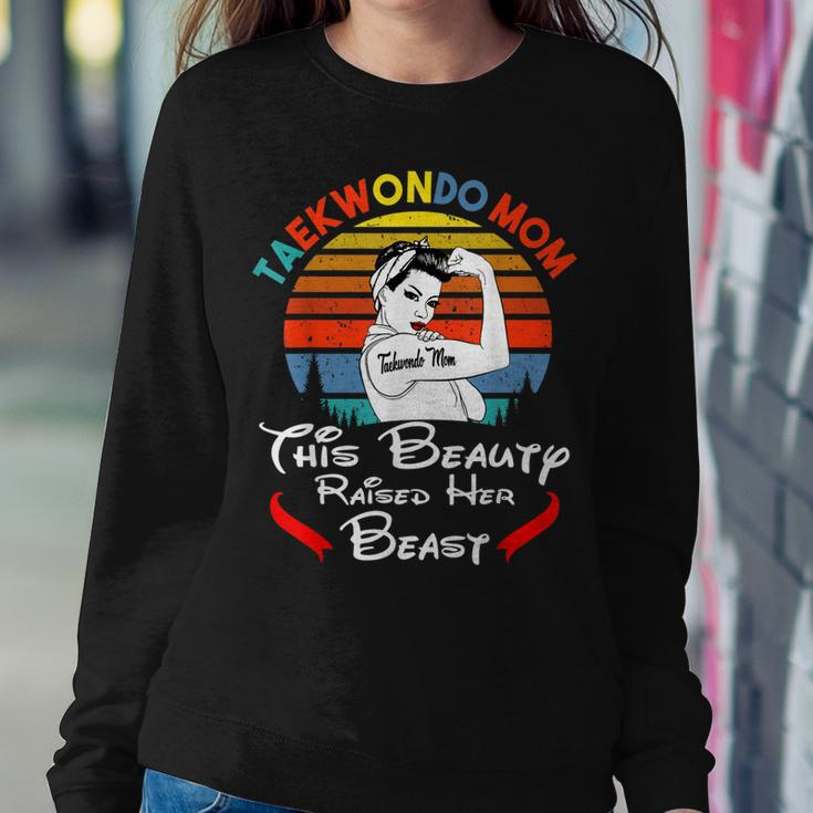 Taekwondo Mom This Beauty Raised Her Beast Women Crewneck Graphic Sweatshirt Personalized Gifts