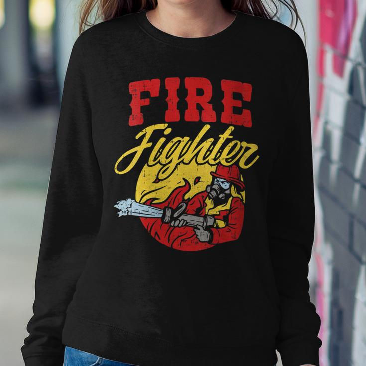 Womens Fire Fighter With Water Hose Fighting The Fire Gift Women Crewneck Graphic Sweatshirt Funny Gifts
