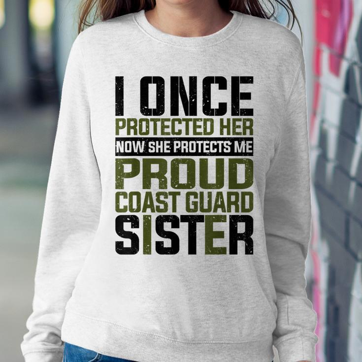 Coast Guard Now She Protects Me Proud Coast Guard Sister Women Crewneck Graphic Sweatshirt Funny Gifts