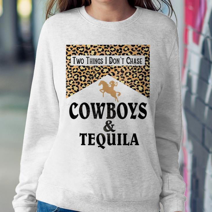 Leopard Two Things We Dont Chase Cowboys And Tequila Rodeo Women Sweatshirt Unique Gifts
