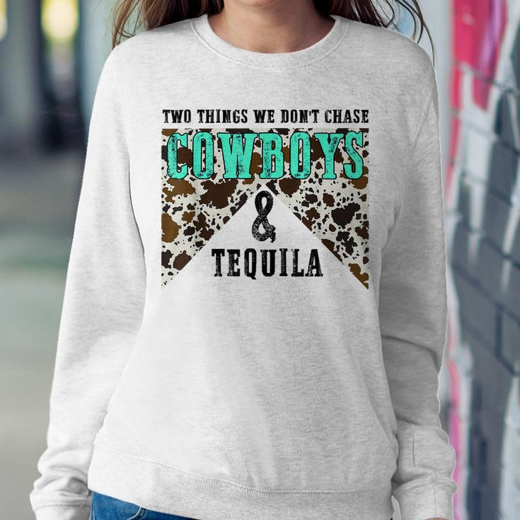 Two Things We Dont Chase Cowboys And Tequila Cowhide Retro Women Sweatshirt Unique Gifts