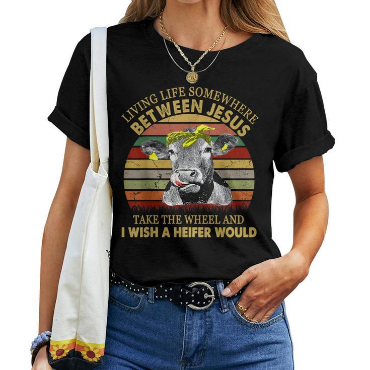 Living Life Somewhere Between Jesus Take The Wheel Cow Women T-shirt