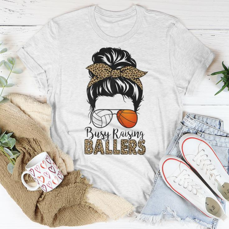 Busy Raising Ballers Basketball And Volleyball Mom Messy Bun Women T-shirt Unique Gifts
