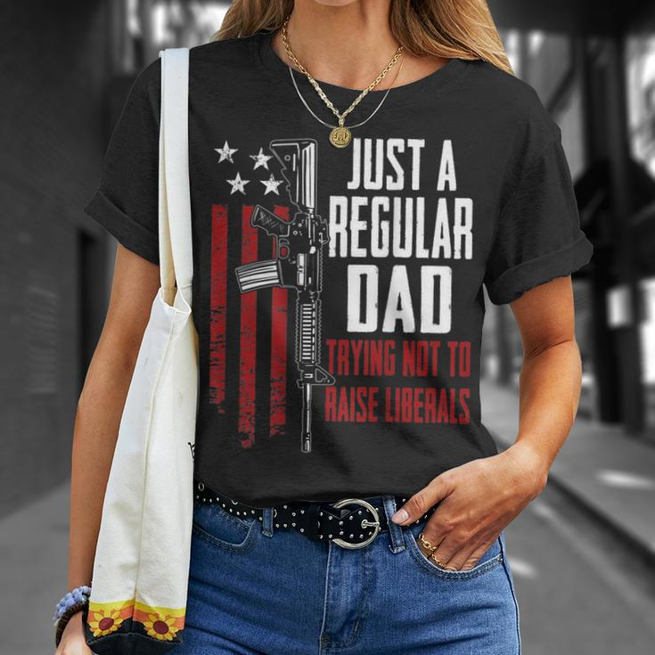 Just A Regular Dad Trying Not To Raise Liberals On Back Unisex T-Shirt Gifts for Her