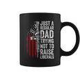 Mens Just A Regular Dad Trying Not To Raise Liberals Fathers Day Coffee Mug