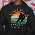 Easily Distracted By Hockey And Tacos Funny Hockey Players Hoodie Unique Gifts