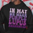 In May We Wear Purple Lupus Awareness Month Groovy Hoodie Unique Gifts