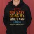 Its Not Easy Being My Wifes Arm Candy But Here I Am Women Hoodie