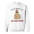 On The Naughty List And I Regret Nothing Funny Cat Christmas Men Women Sweatshirt Graphic Print Unisex