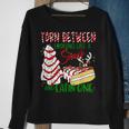 Torn Between Looking Like A Snack And Eating One Christmas V3 Men Women Sweatshirt Graphic Print Unisex Gifts for Old Women